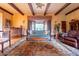 Living room showcasing hardwood floors, unique decor, and large windows at 363 E Monte Vista Rd, Phoenix, AZ 85004