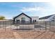 View of a backyard with a fenced in pool surrounded by new home construction at 2136 E Paradise Ln, Phoenix, AZ 85022
