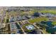 Aerial view of tennis courts, pickleball courts, lake and community amenities at 12075 N San Clemente St, Surprise, AZ 85388