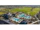 Stunning aerial view of the community pool and golf course in a gated community at 12075 N San Clemente St, Surprise, AZ 85388