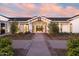 Stunning building exterior with modern farmhouse design and inviting entrance at 12075 N San Clemente St, Surprise, AZ 85388