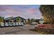Golf carts parked in front of clubhouse at stunning gated community at 12075 N San Clemente St, Surprise, AZ 85388