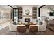 Cozy living room featuring a charming fireplace and comfortable seating area at 12075 N San Clemente St, Surprise, AZ 85388