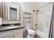 Bathroom with granite countertop, bathtub, and shower at 12943 W Mclellan Rd, Glendale, AZ 85307