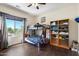 Bright bedroom with a bunk bed, large window, and a spacious layout at 12943 W Mclellan Rd, Glendale, AZ 85307