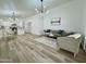 Open concept living room showcases modern decor, stylish furnishings, and hardwood floors at 5984 W Geronimo Ct, Chandler, AZ 85226