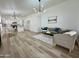 Bright and airy living area features modern furnishings, hardwood floors, and open concept at 5984 W Geronimo Ct, Chandler, AZ 85226