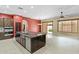 Spacious kitchen with large island, dark wood cabinetry, and stainless steel appliances at 1553 E Zion Way, Chandler, AZ 85249