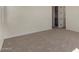 Cozy bedroom with soft carpeting, a closet, and a serene atmosphere for relaxation at 2878 N Evergreen St, Buckeye, AZ 85396