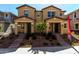 Inviting two-story home showcasing stylish elevations, desert landscaping, and private entrances at 2878 N Evergreen St, Buckeye, AZ 85396