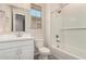 Bright bathroom featuring a shower-tub combo and a vanity with a white countertop at 2888 N Evergreen St, Buckeye, AZ 85396