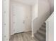Entryway features wood-look flooring, staircase and storage at 2888 N Evergreen St, Buckeye, AZ 85396