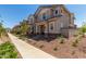 Attractive facade with well-manicured walkway leading to front door, with easy access to street at 2888 N Evergreen St, Buckeye, AZ 85396