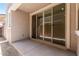 Concrete patio features a large glass slider door to the home's interior at 2888 N Evergreen St, Buckeye, AZ 85396
