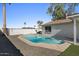 Cool off in the beautiful pool, surrounded by easy to maintain landscaping at 2409 E Hampton Ave, Mesa, AZ 85204