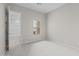 This bedroom features carpeted floors and a view of the bathroom at 12315 W Parkway Ln, Avondale, AZ 85323