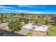 Beautiful aerial view of a golf course community with well-maintained landscaping and single Gathering homes at 10224 E Michigan Ave, Sun Lakes, AZ 85248