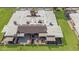 Aerial view of backyard patio and roof with AC units at 10224 E Michigan Ave, Sun Lakes, AZ 85248