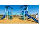 Community playground with slides and climbing structures at 15409 W Corrine Dr, Surprise, AZ 85379