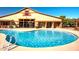 Inviting pool area featuring restrooms and showers for convenience at 15409 W Corrine Dr, Surprise, AZ 85379