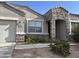 One-story home with stone accents and a landscaped front yard at 30346 W Columbus Ave, Buckeye, AZ 85396