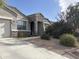 One-story home with stone accents and a landscaped front yard at 30346 W Columbus Ave, Buckeye, AZ 85396