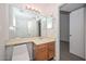 Bathroom featuring a vanity with sink, toilet, and large mirror at 7977 W Wacker Rd # 174, Peoria, AZ 85381