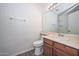 Bathroom featuring a vanity with sink, toilet, and large mirror at 7977 W Wacker Rd # 174, Peoria, AZ 85381