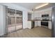 Functional kitchen with wood counters, stainless steel appliances and patio access at 7977 W Wacker Rd # 174, Peoria, AZ 85381