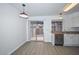 Inviting kitchen area with wood counters and sliding glass doors to the patio at 7977 W Wacker Rd # 174, Peoria, AZ 85381