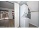 Convenient laundry closet featuring stacked washer and dryer units near kitchen at 7977 W Wacker Rd # 174, Peoria, AZ 85381
