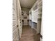 Spacious walk-in closet with ample shelving and hanging space at 10538 W Quail Ave, Peoria, AZ 85382