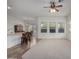 Bright living room with a breakfast bar, tile floors, and large windows offering ample natural light at 26 S Quinn Cir # 7, Mesa, AZ 85206