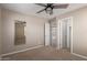 Comfortable bedroom showcasing access to other rooms, ideal for modern living at 272 N 167Th Ln, Goodyear, AZ 85338