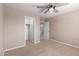 Comfortable bedroom showcasing access to other rooms, ideal for modern living at 272 N 167Th Ln, Goodyear, AZ 85338