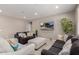 Spacious living room with neutral tones, perfect for entertaining or relaxing at 272 N 167Th Ln, Goodyear, AZ 85338