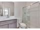 Bathroom with single sink, shower, and toilet at 18424 W Monte Lindo Ln, Surprise, AZ 85387