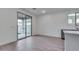 Bright dining area with sliding glass door to backyard at 18424 W Monte Lindo Ln, Surprise, AZ 85387