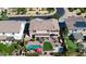 A bird's eye view of a two-story home featuring a private pool and meticulously landscaped backyard at 7156 S Forest Ave, Gilbert, AZ 85298