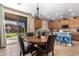 Bright kitchen with an eat-in area and backyard access at 7156 S Forest Ave, Gilbert, AZ 85298