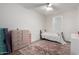 Cozy bedroom featuring neutral walls, a large rug, and ample natural light at 20025 W Madison St, Buckeye, AZ 85326