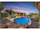 Inviting pool and spa with a rock waterfall feature at 30813 N 138Th St, Scottsdale, AZ 85262