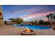 Stunning pool area, fire pit, and patio furniture at 30813 N 138Th St, Scottsdale, AZ 85262