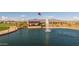 Lake with a central fountain and a lakeside pavilion at 10130 S Bickwell Trl, Apache Junction, AZ 85120