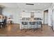 Modern kitchen with white cabinets and an island at 15832 E Brittlebush Ln, Fountain Hills, AZ 85268