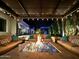 Relaxing backyard with a modern fire pit and plush seating under a stylish pergola at 2652 E Pelican Ct, Gilbert, AZ 85297