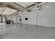 Spacious garage with high ceilings, epoxy flooring and ample storage at 2652 E Pelican Ct, Gilbert, AZ 85297