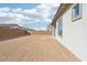 Unlandscaped backyard providing endless possibilities at 22837 E Alyssa Rd, Queen Creek, AZ 85142