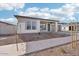 Single-story home with light gray exterior and front yard landscaping at 22837 E Alyssa Rd, Queen Creek, AZ 85142
