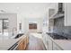 Modern kitchen with stainless steel appliances and an island at 22837 E Alyssa Rd, Queen Creek, AZ 85142